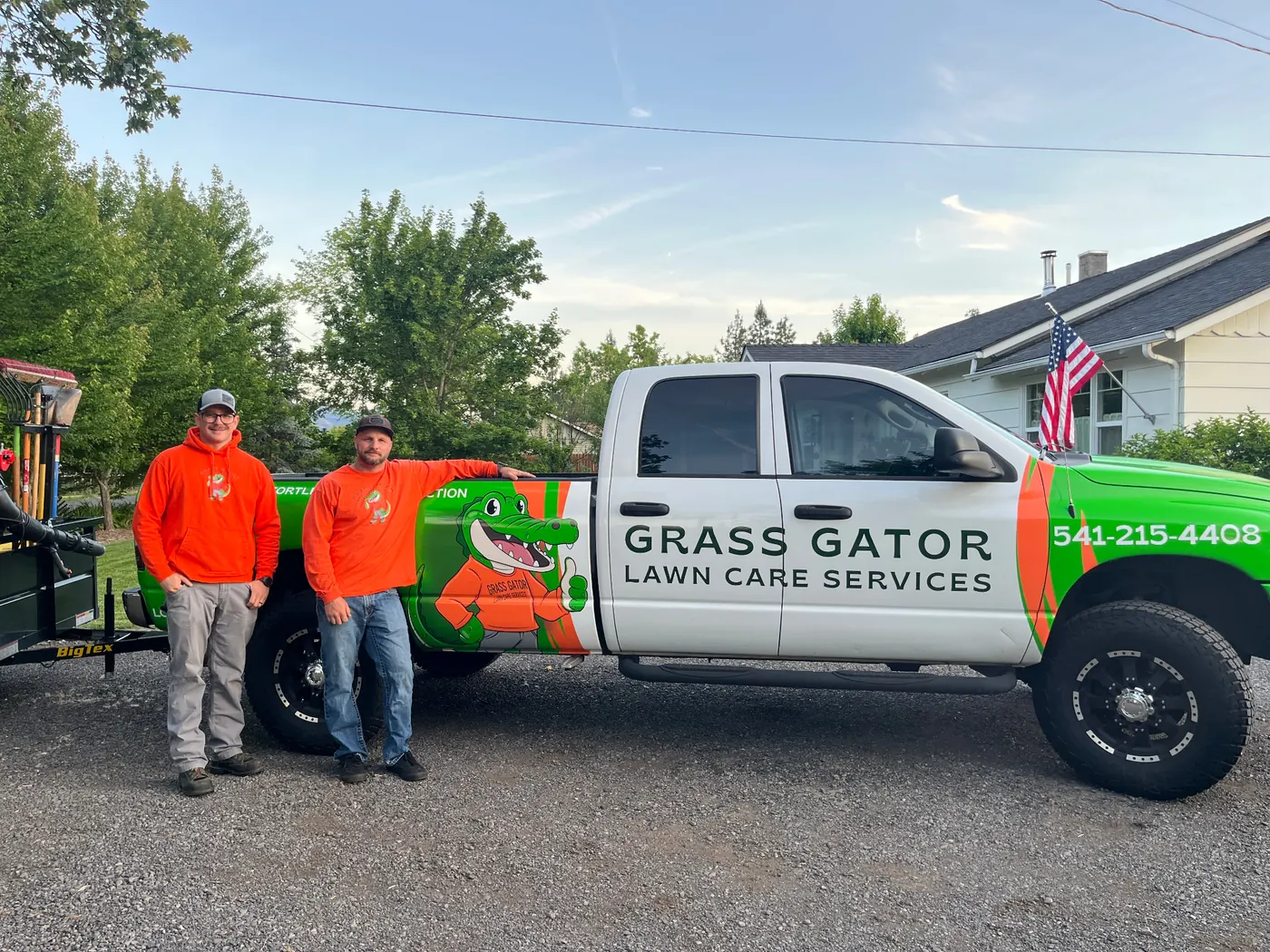Grass Gator team with branded truck